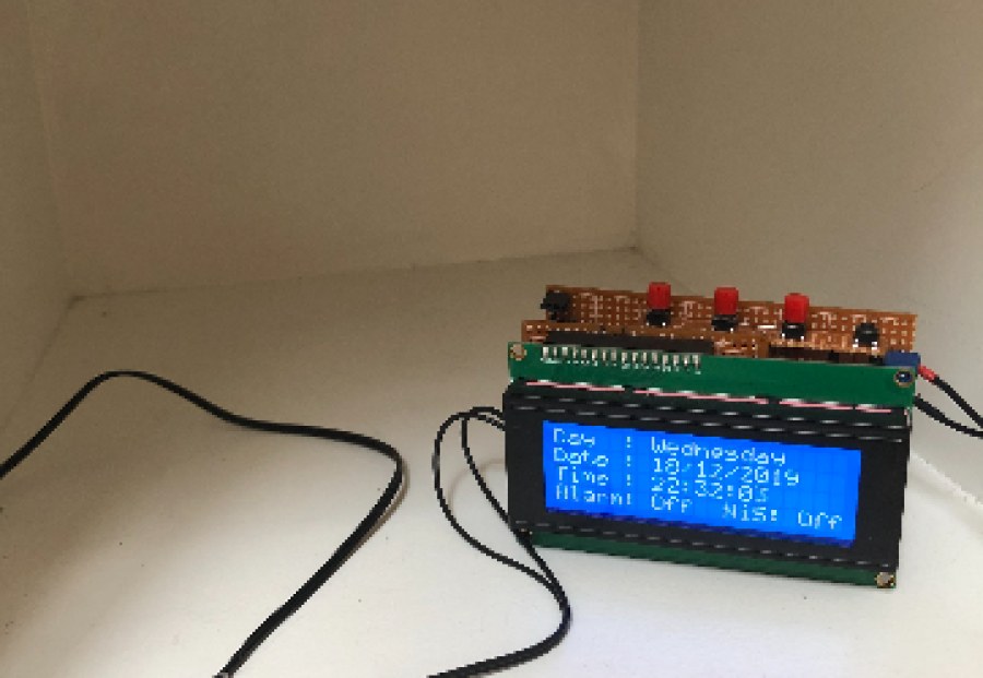 Electric shock clock with LCD and circuit board